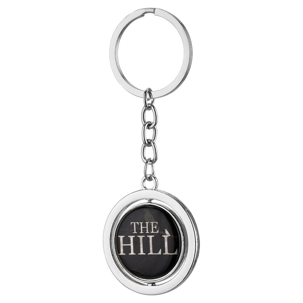 Noir avec application grise lugubre et lettres blanches « The Hill »